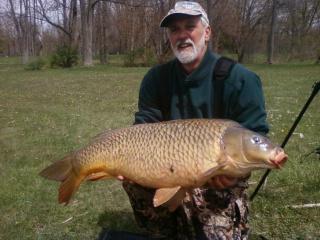 Joe Rinaldo Jr with a 30 lb, 9 oz common carp caught during 